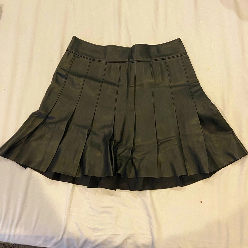Black faux leather pleated miniskirt